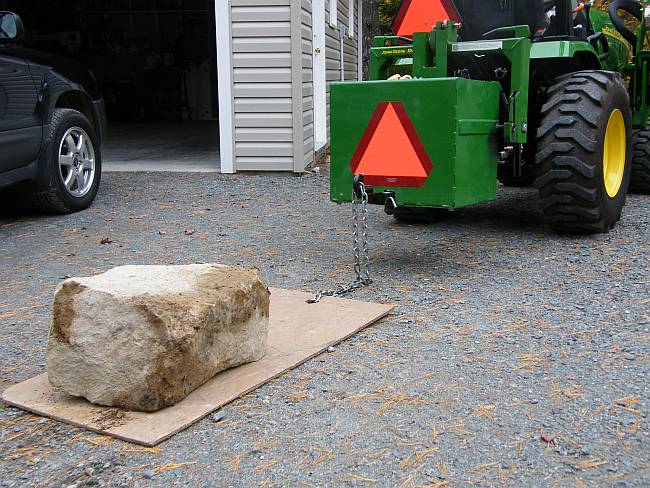 how to pick up rocks with a tractor